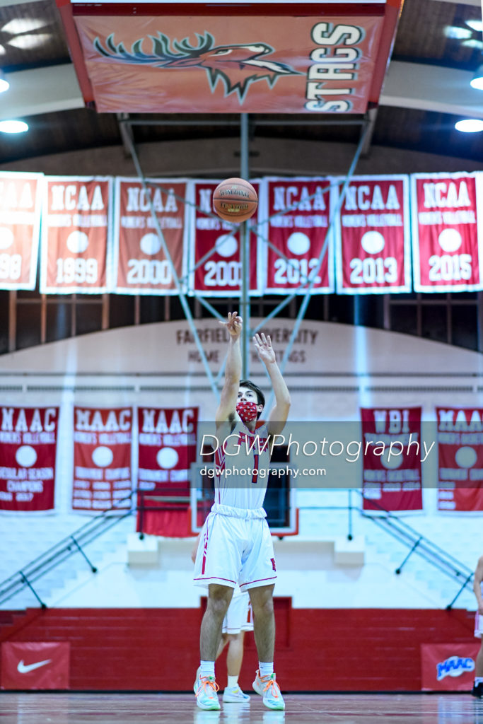 Max Manjos of Fairfield Prep sinks a free throw during the last game played at Alumni Hall.