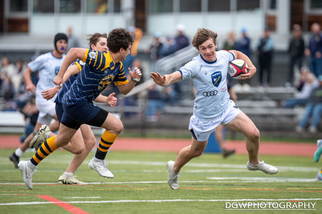 Fairfield's Colin Walker takes the ball all the way in for the score against Simsbury in High School Rugby action on Saturday.