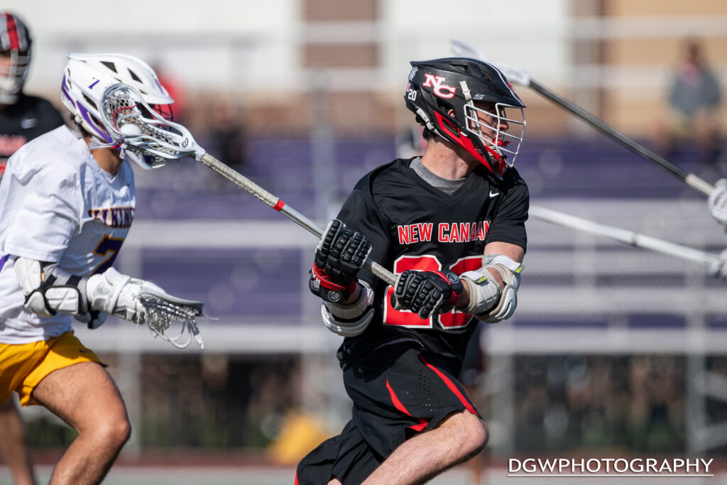 New Canaan's Cooper Smith looks to take a shot on goal against Westhill on Wednesday.